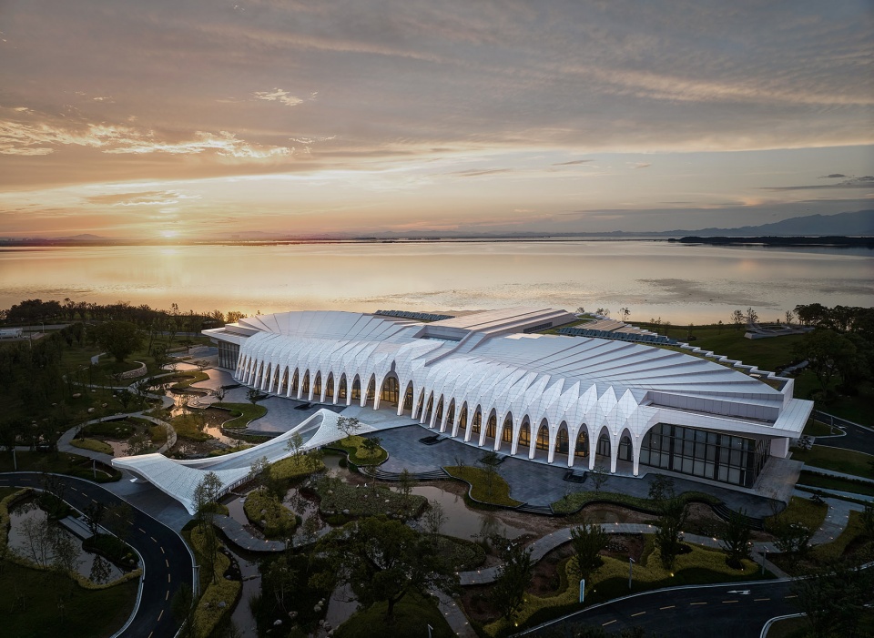 international migratory bird town convention exhibition center by oi architects