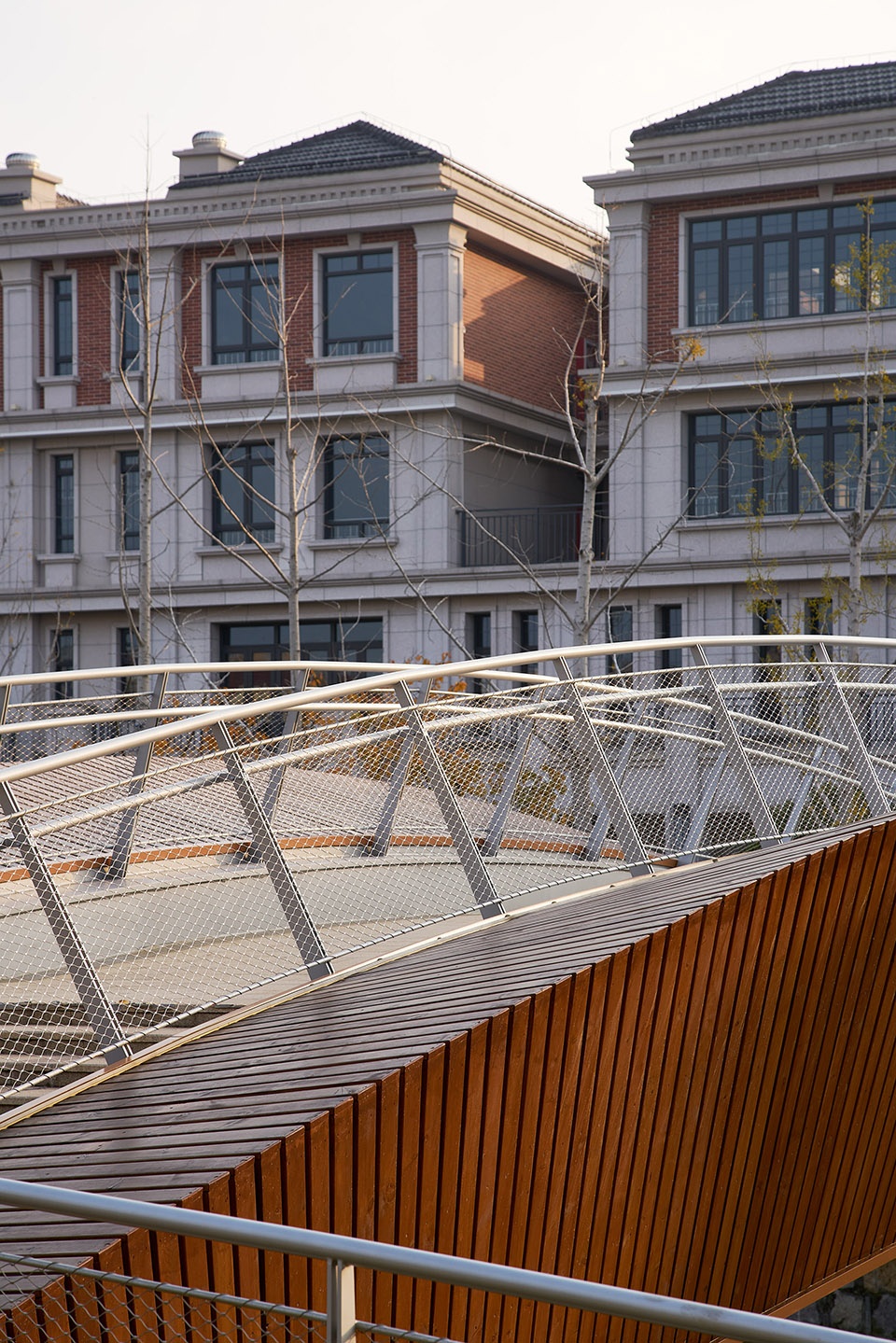 a leaf of boat the reconstruction of a convenient bridge in new jiangwan neighborhood shanghai by l and m