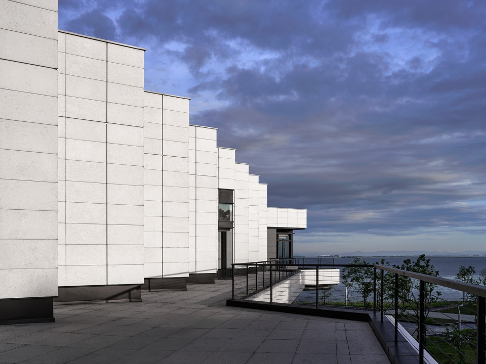 international migratory bird town convention exhibition center by oi architects