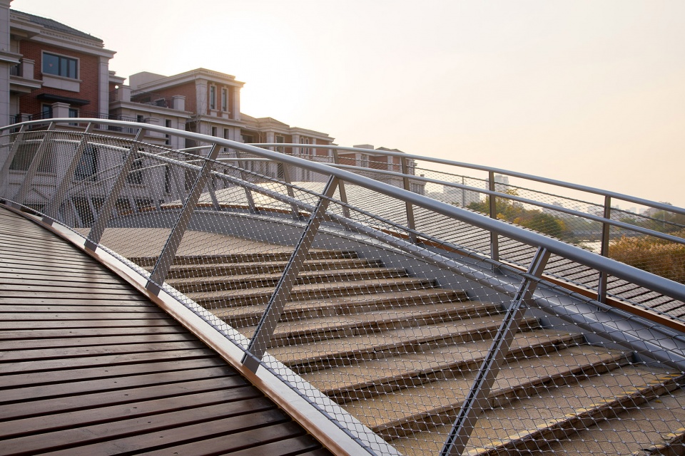 a leaf of boat the reconstruction of a convenient bridge in new jiangwan neighborhood shanghai by l and m