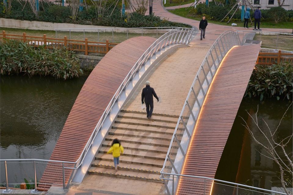 a leaf of boat the reconstruction of a convenient bridge in new jiangwan neighborhood shanghai by l and m