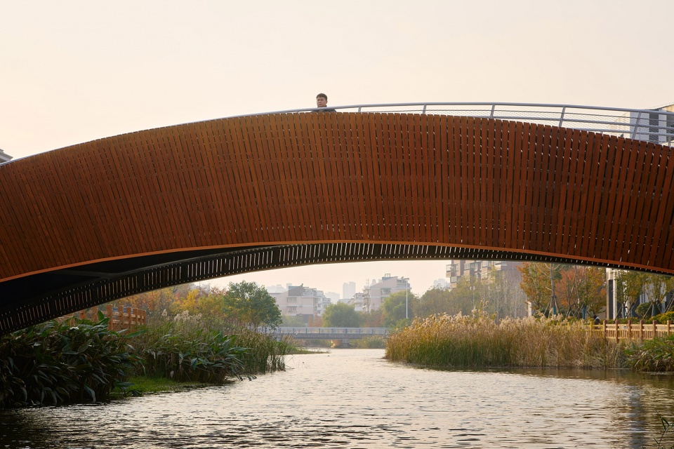 a leaf of boat the reconstruction of a convenient bridge in new jiangwan neighborhood shanghai by l and m