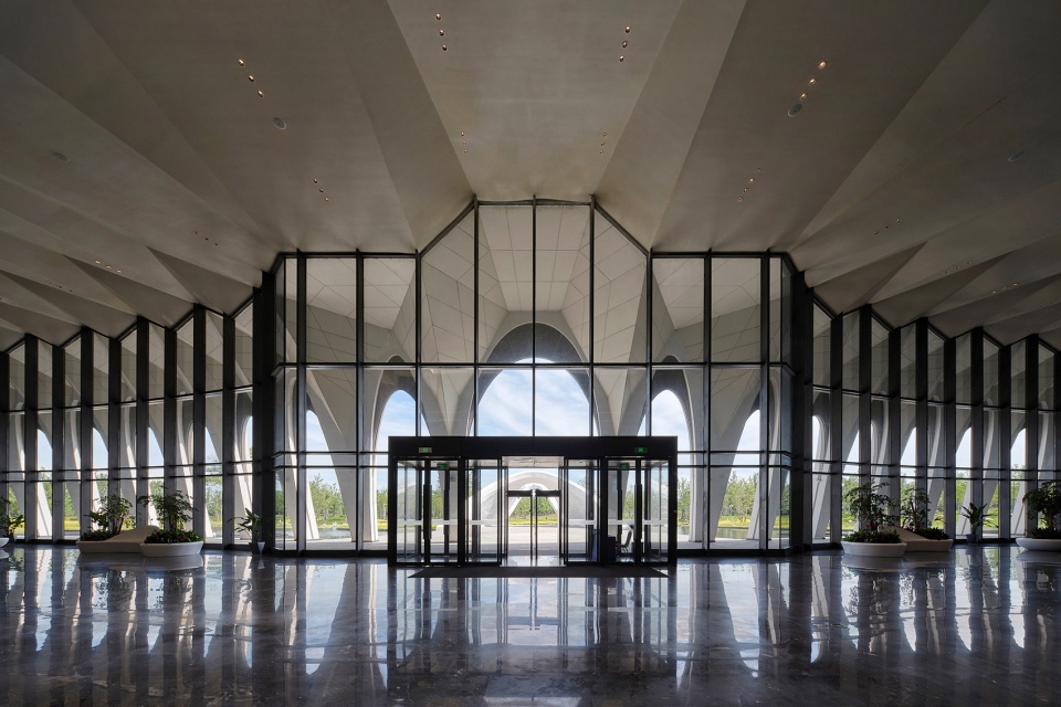 international migratory bird town convention exhibition center by oi architects