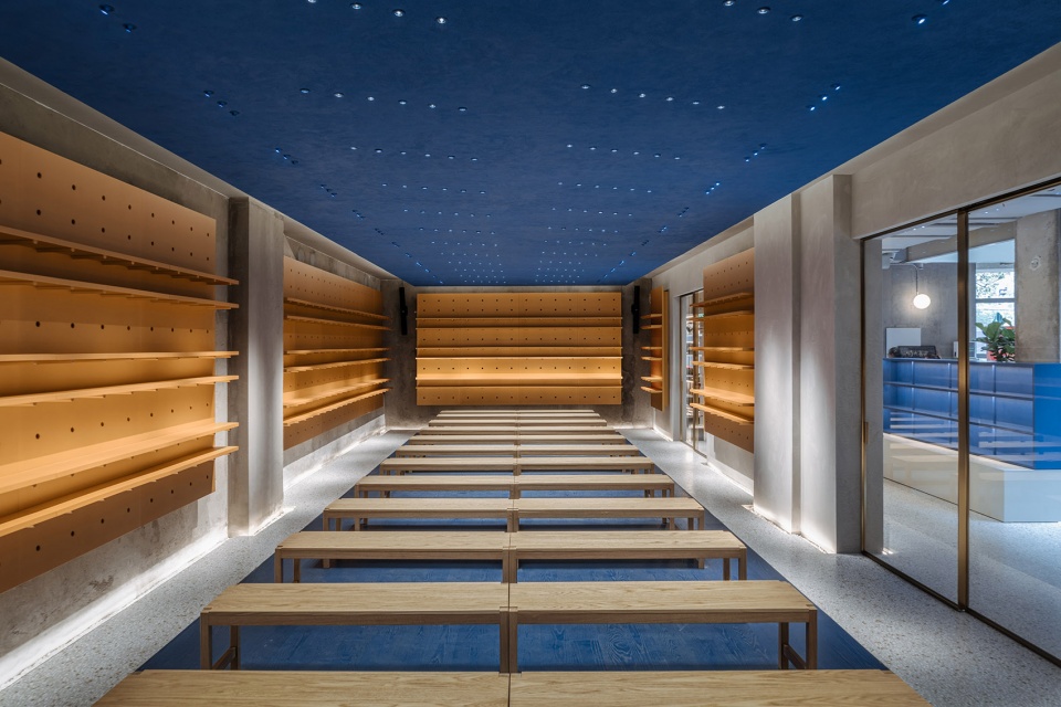 university sport book store by studio yuda studio nor