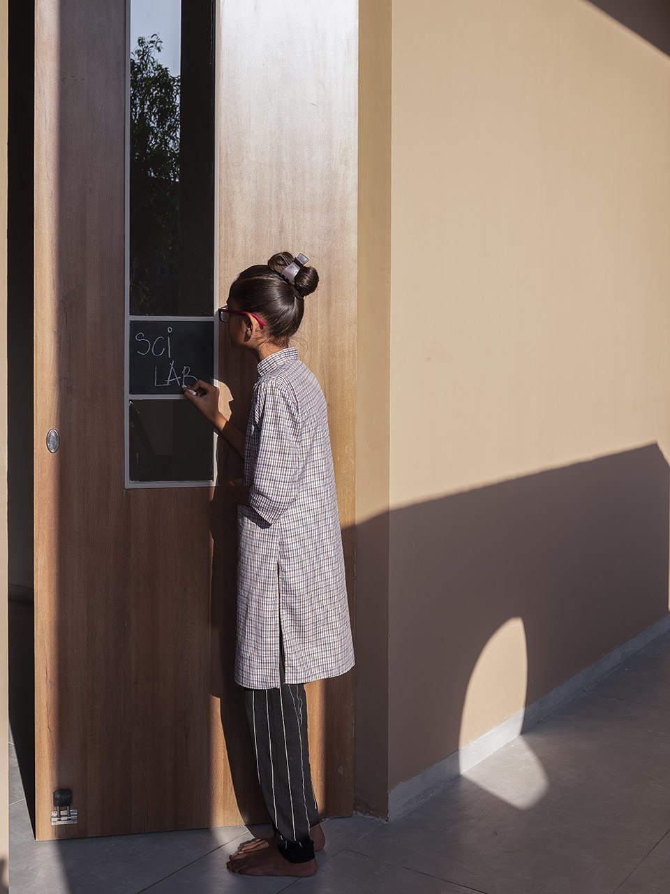 school under a neem by dhulia architecture design