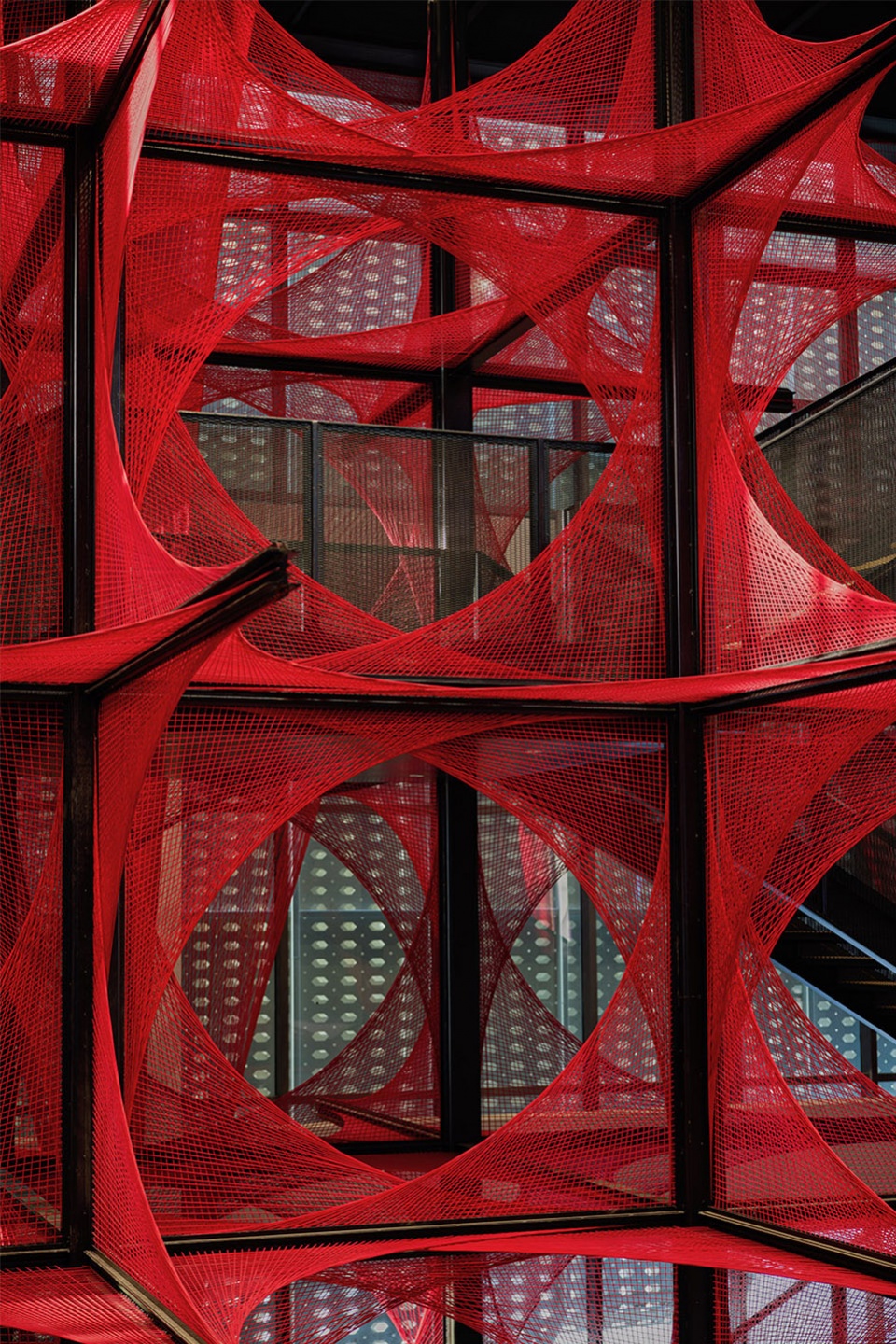 the flower of tujia at the china tujia brocade art museum by yimu design office