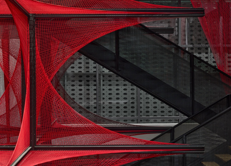 the flower of tujia at the china tujia brocade art museum by yimu design office