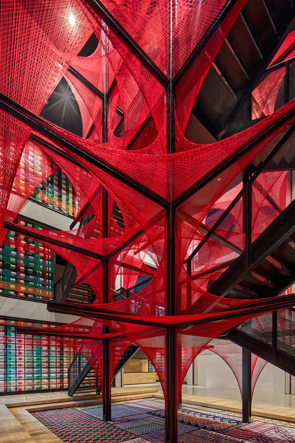 the flower of tujia at the china tujia brocade art museum by yimu design office