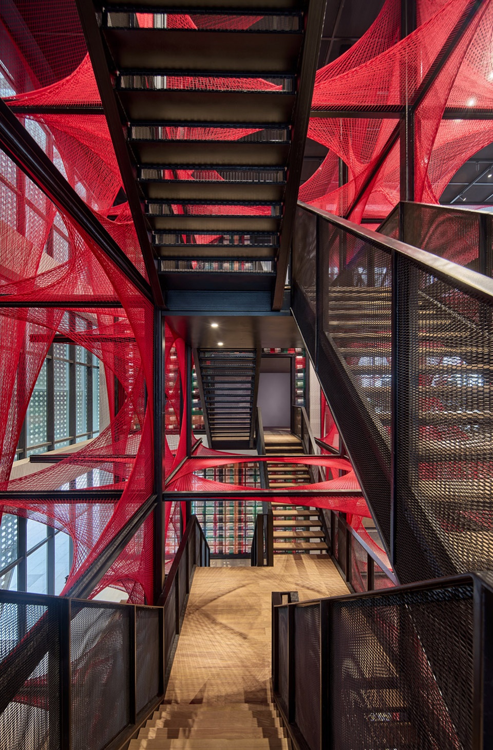 the flower of tujia at the china tujia brocade art museum by yimu design office