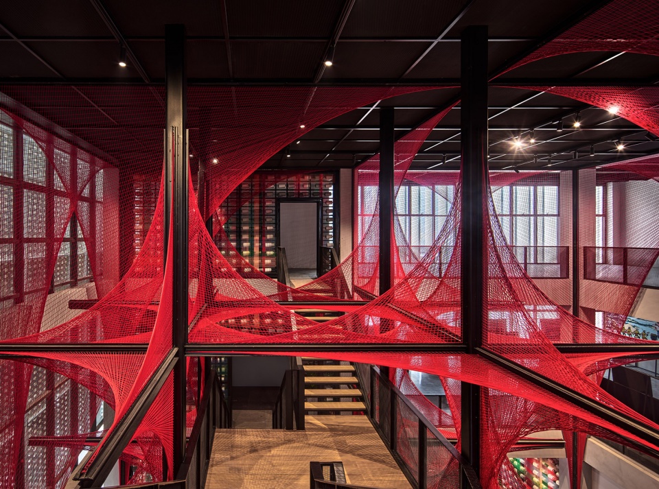 the flower of tujia at the china tujia brocade art museum by yimu design office