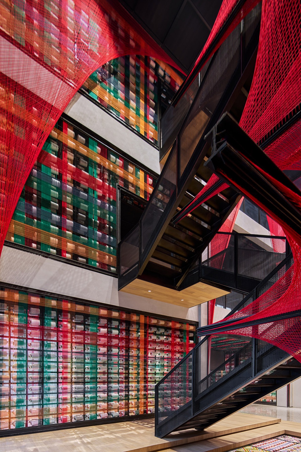 the flower of tujia at the china tujia brocade art museum by yimu design office