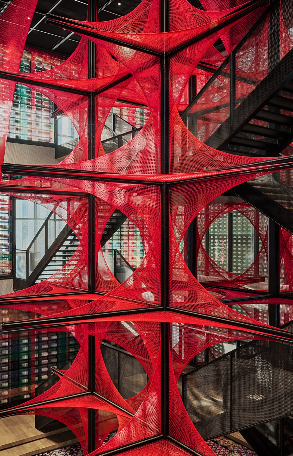 the flower of tujia at the china tujia brocade art museum by yimu design office