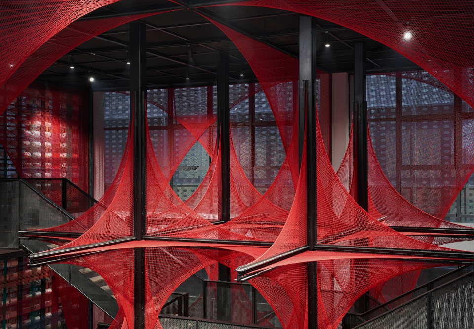 the flower of tujia at the china tujia brocade art museum by yimu design office