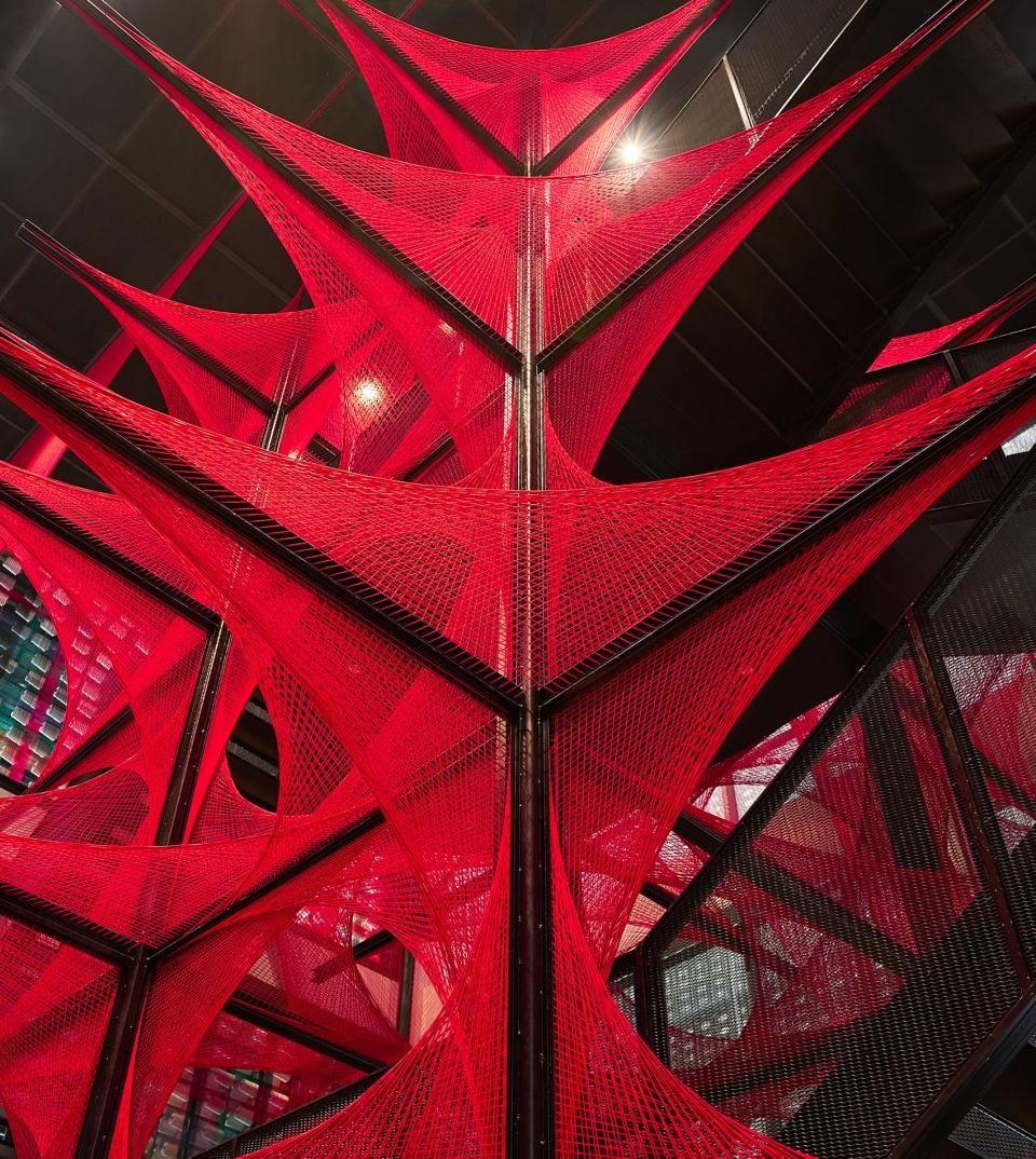 the flower of tujia at the china tujia brocade art museum by yimu design office
