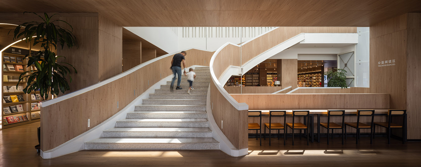 Xinhua Bookstore Yuxi Nie Er Book City China By Poetic Design Office xinhua-bookstore-yuxi-nie-er-book-city-china-by-poetic-design-office