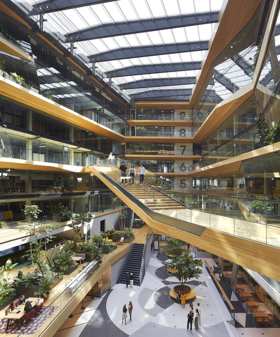 unstudios new city campus for travel leader booking com opens in amsterdam
