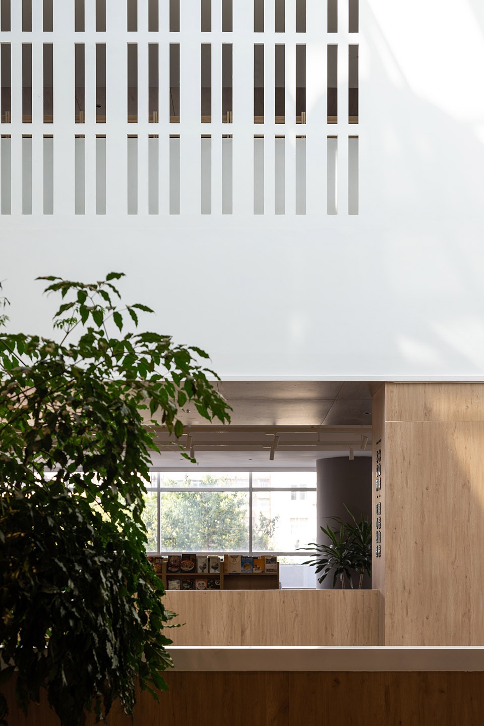 Xinhua Bookstore Yuxi Nie Er Book City China by Poetic Design Office of S P Space