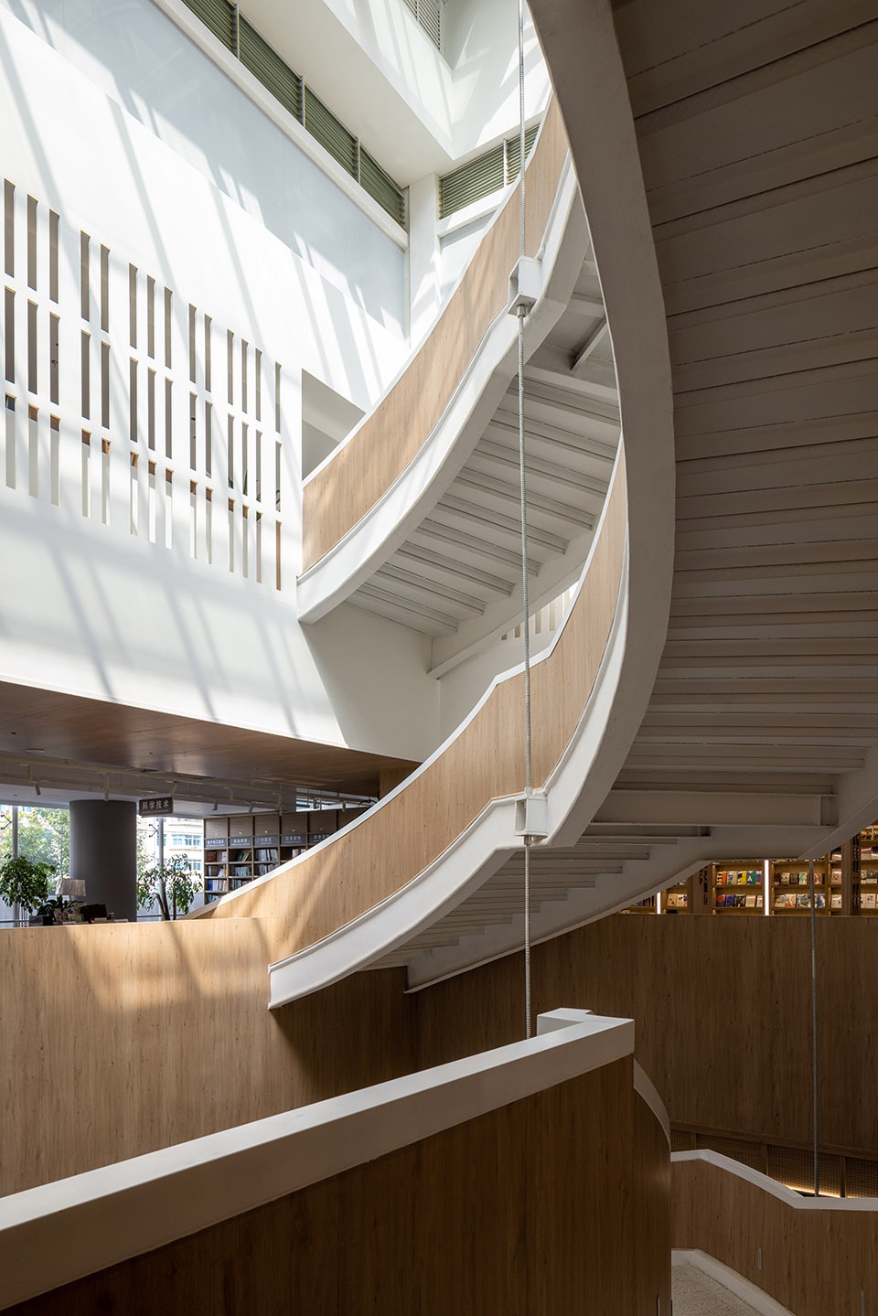 Xinhua Bookstore Yuxi Nie Er Book City China by Poetic Design Office of S P Space