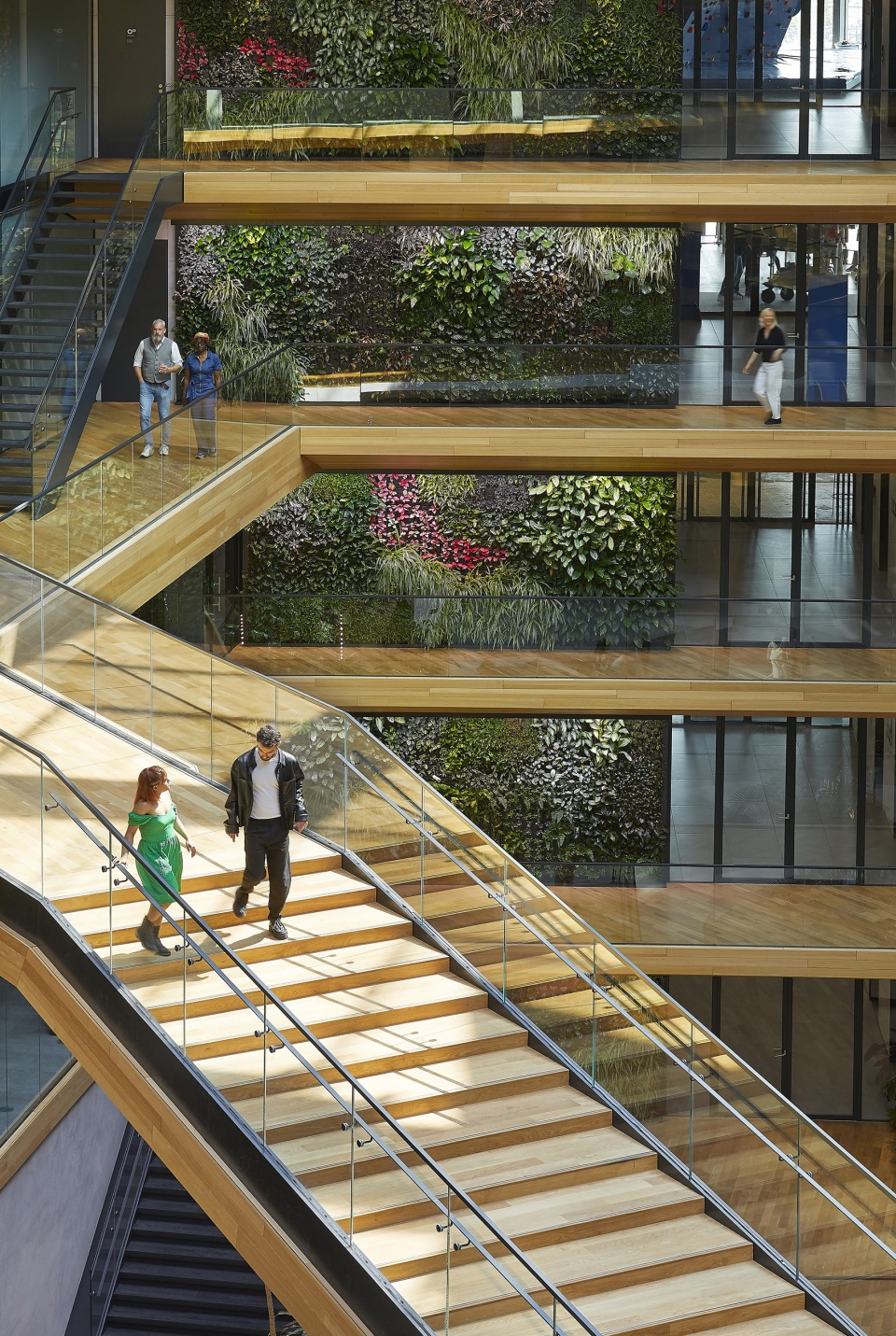 unstudios new city campus for travel leader booking com opens in amsterdam