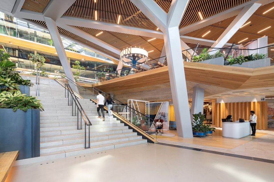 unstudios new city campus for travel leader booking com opens in amsterdam