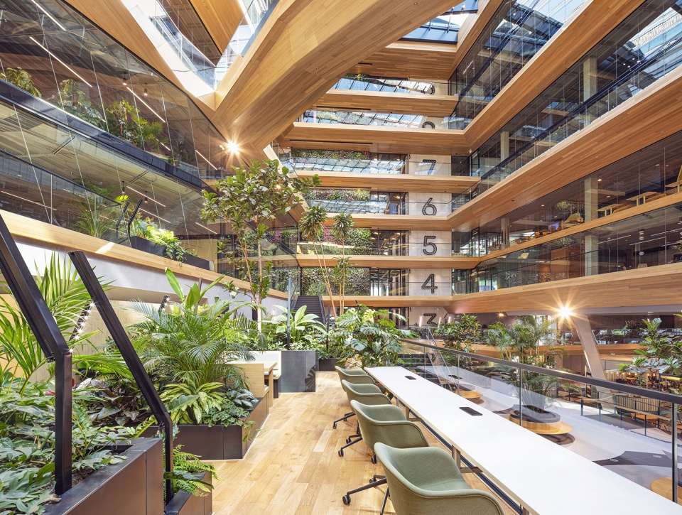 unstudios new city campus for travel leader booking com opens in amsterdam