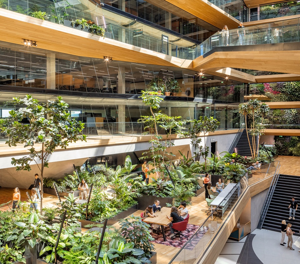 unstudios new city campus for travel leader booking com opens in amsterdam