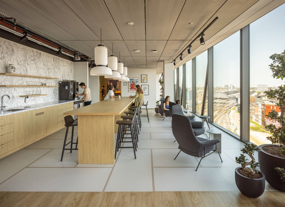 unstudios new city campus for travel leader booking com opens in amsterdam