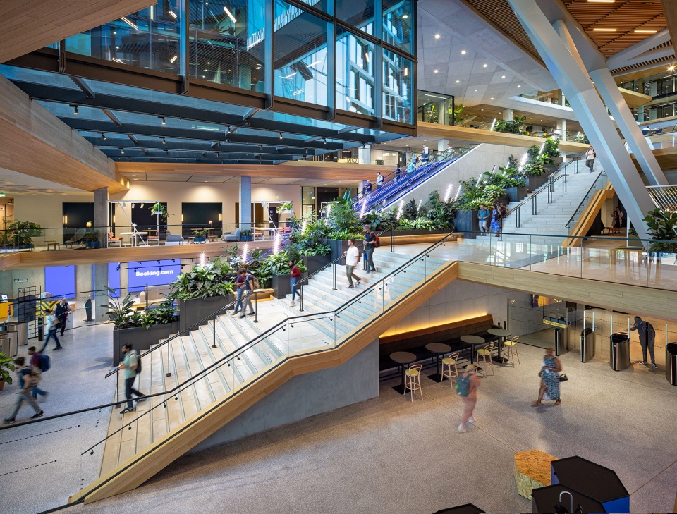 unstudios new city campus for travel leader booking com opens in amsterdam