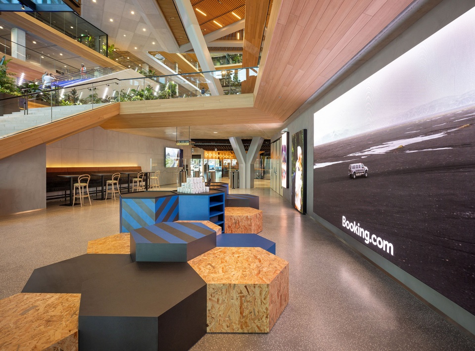 unstudios new city campus for travel leader booking com opens in amsterdam
