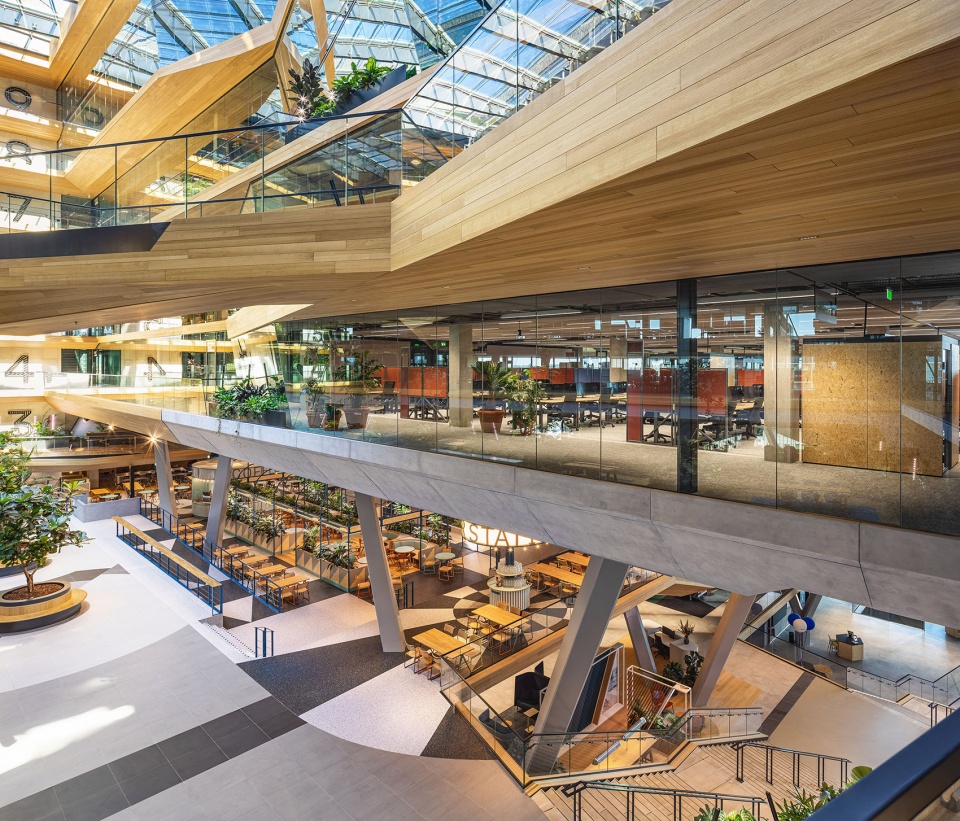 unstudios new city campus for travel leader booking com opens in amsterdam