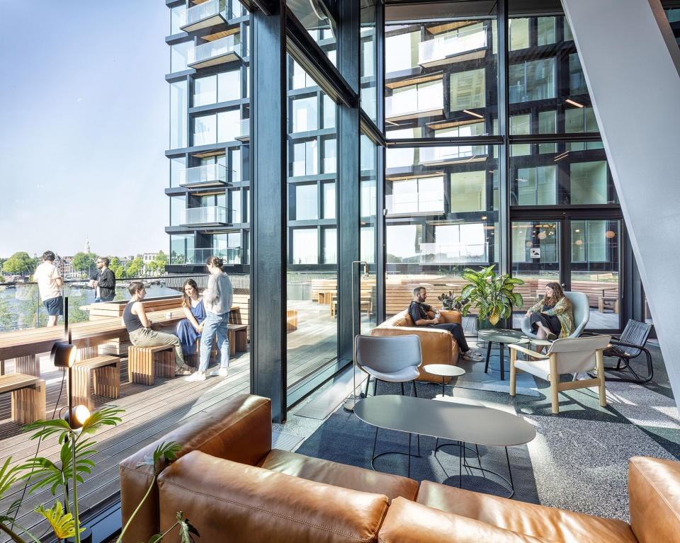 unstudios new city campus for travel leader booking com opens in amsterdam