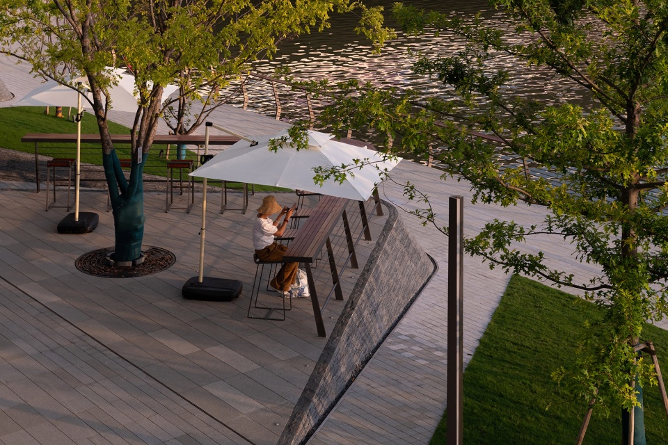 the waterfront of the asian games village by atelier scale