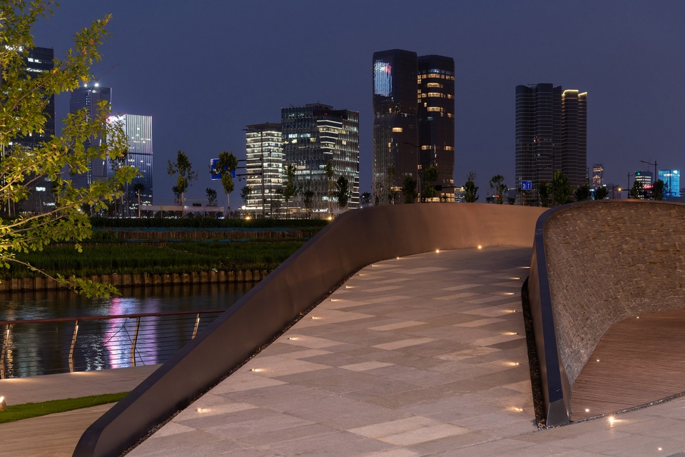 the waterfront of the asian games village by atelier scale