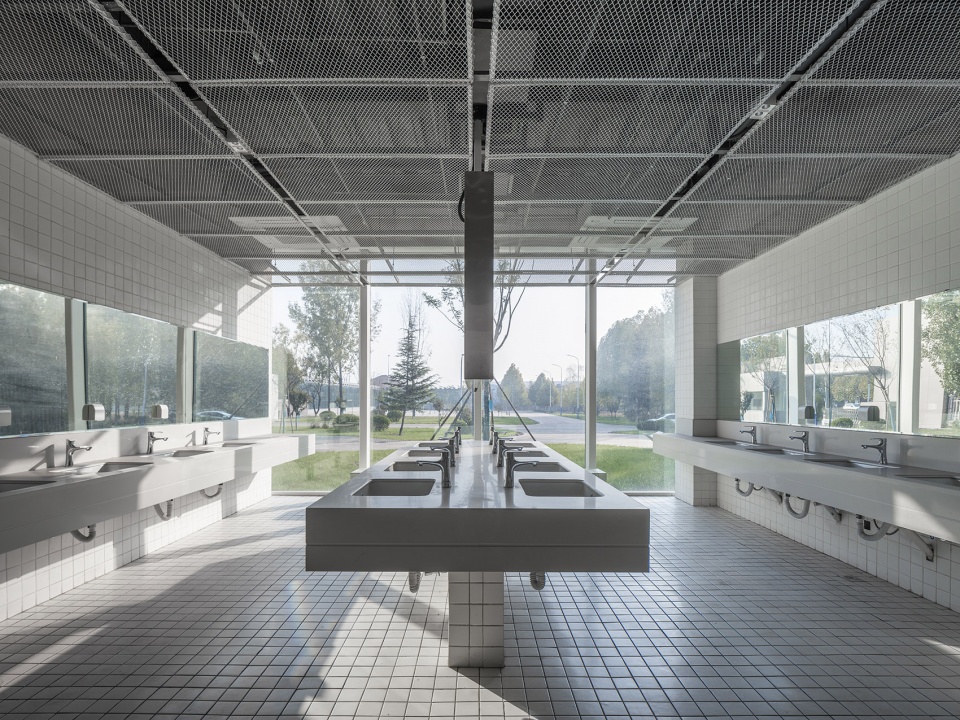 Xiangfen Xingyuan Swimming Pool by Atelier Kai Architects
