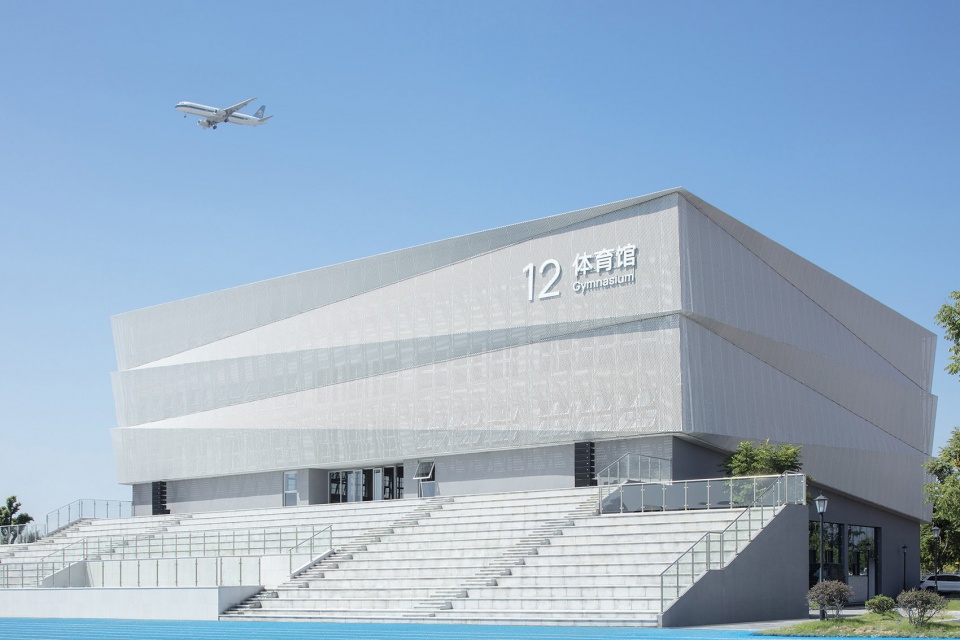 Ningbo Gulin Vocational High School by ARCHIS Design Studio
