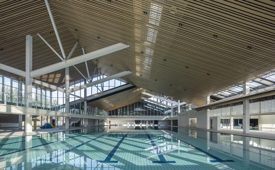 Xiangfen Xingyuan Swimming Pool by Atelier Kai Architects