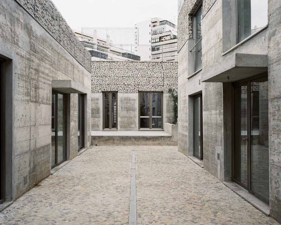 three exposed concrete facades by corpo atelier