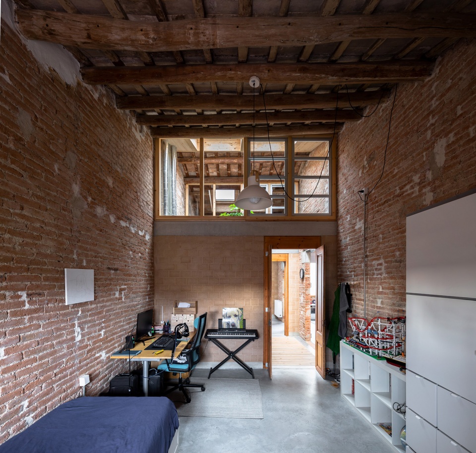 rehabilitation of two adjoining houses installation by arqbag