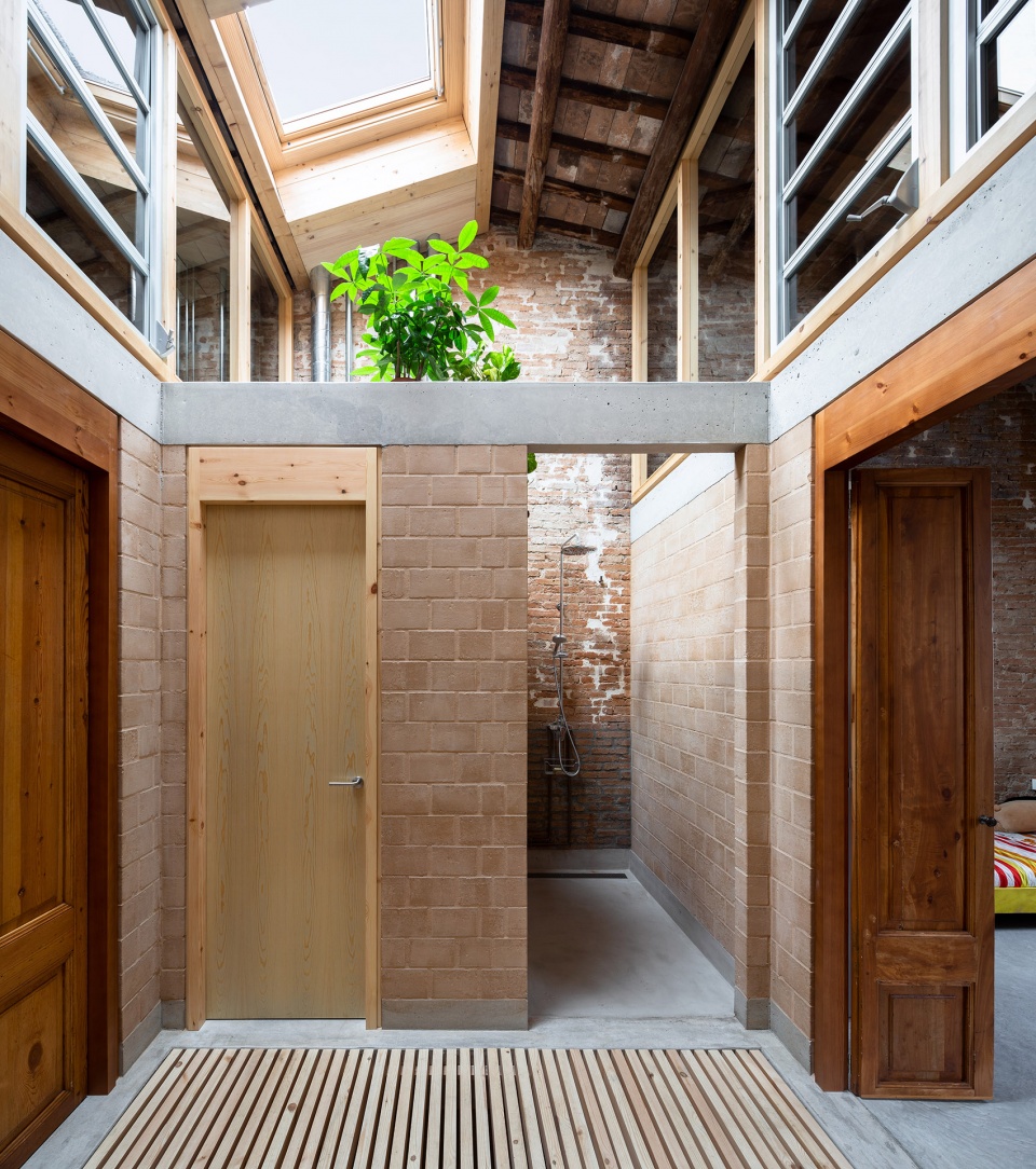 rehabilitation of two adjoining houses installation by arqbag
