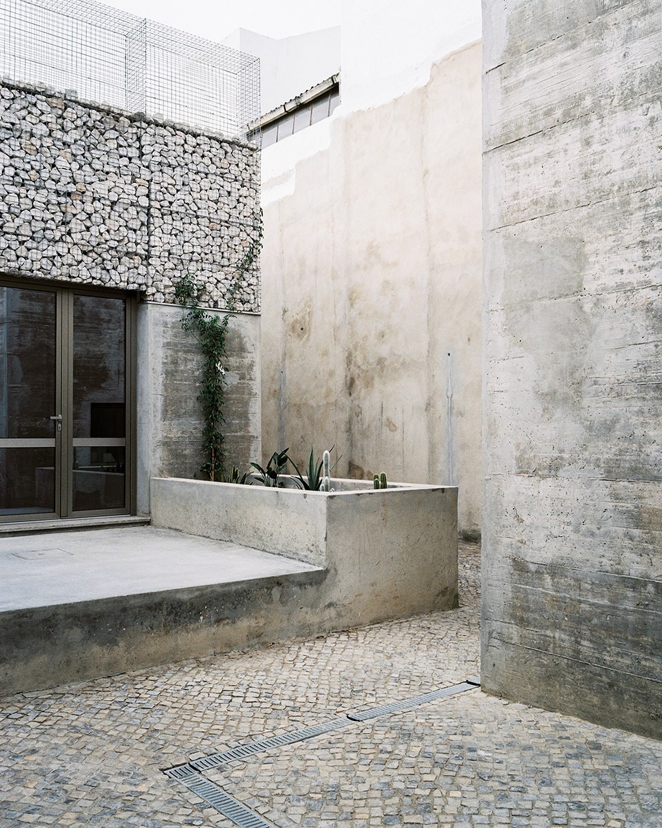 three exposed concrete facades by corpo atelier