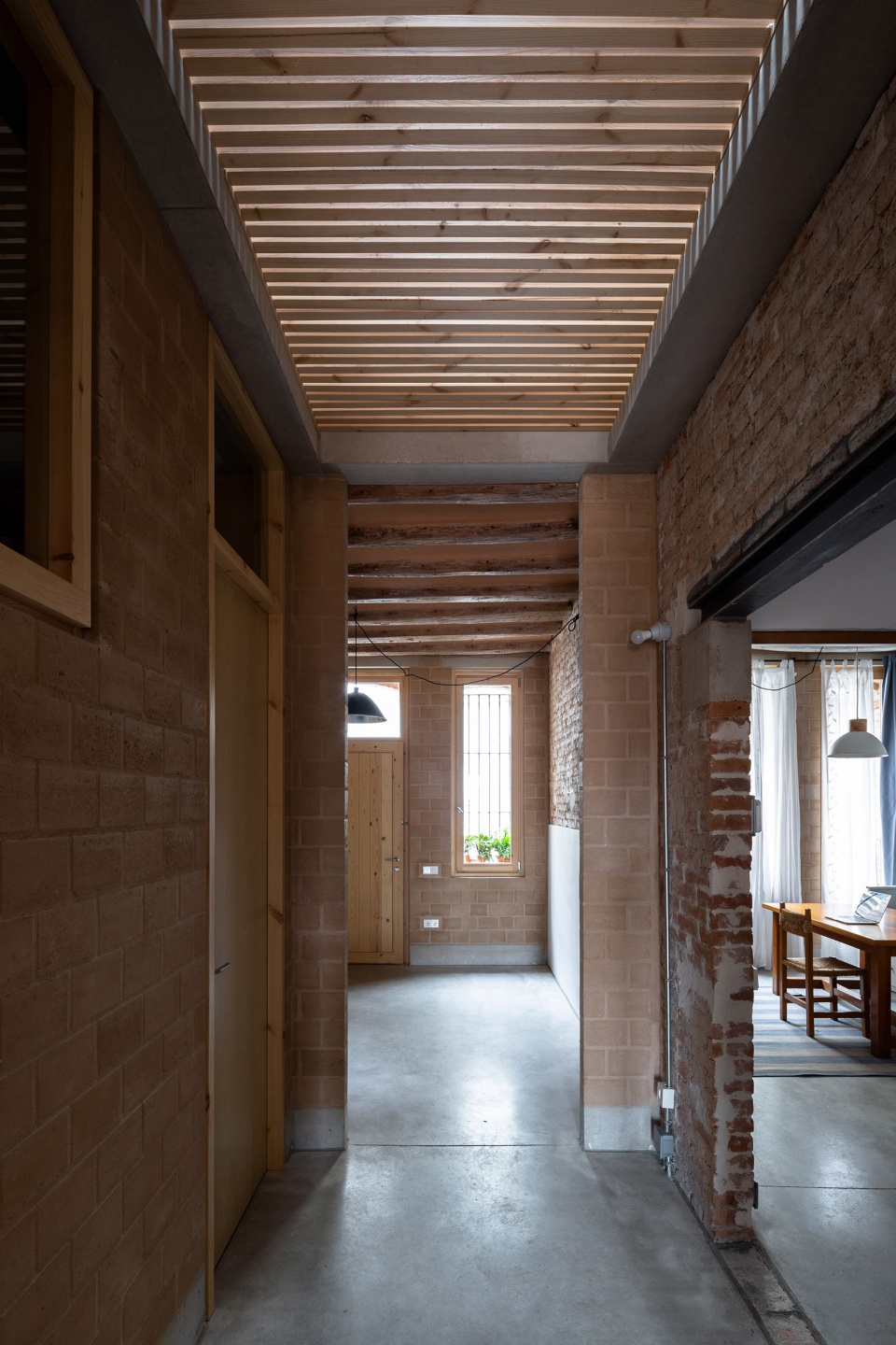 rehabilitation of two adjoining houses installation by arqbag