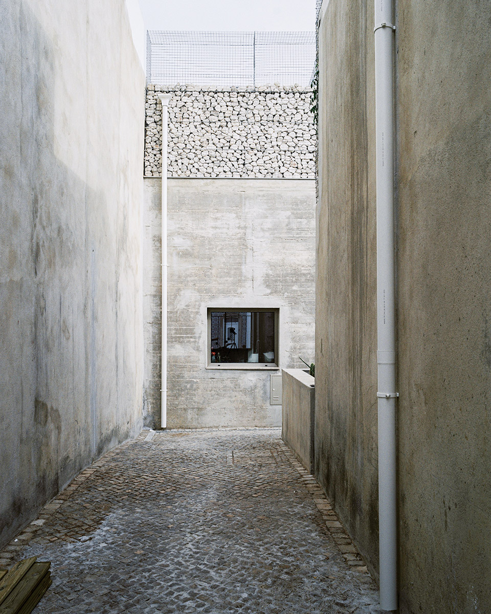 three exposed concrete facades by corpo atelier
