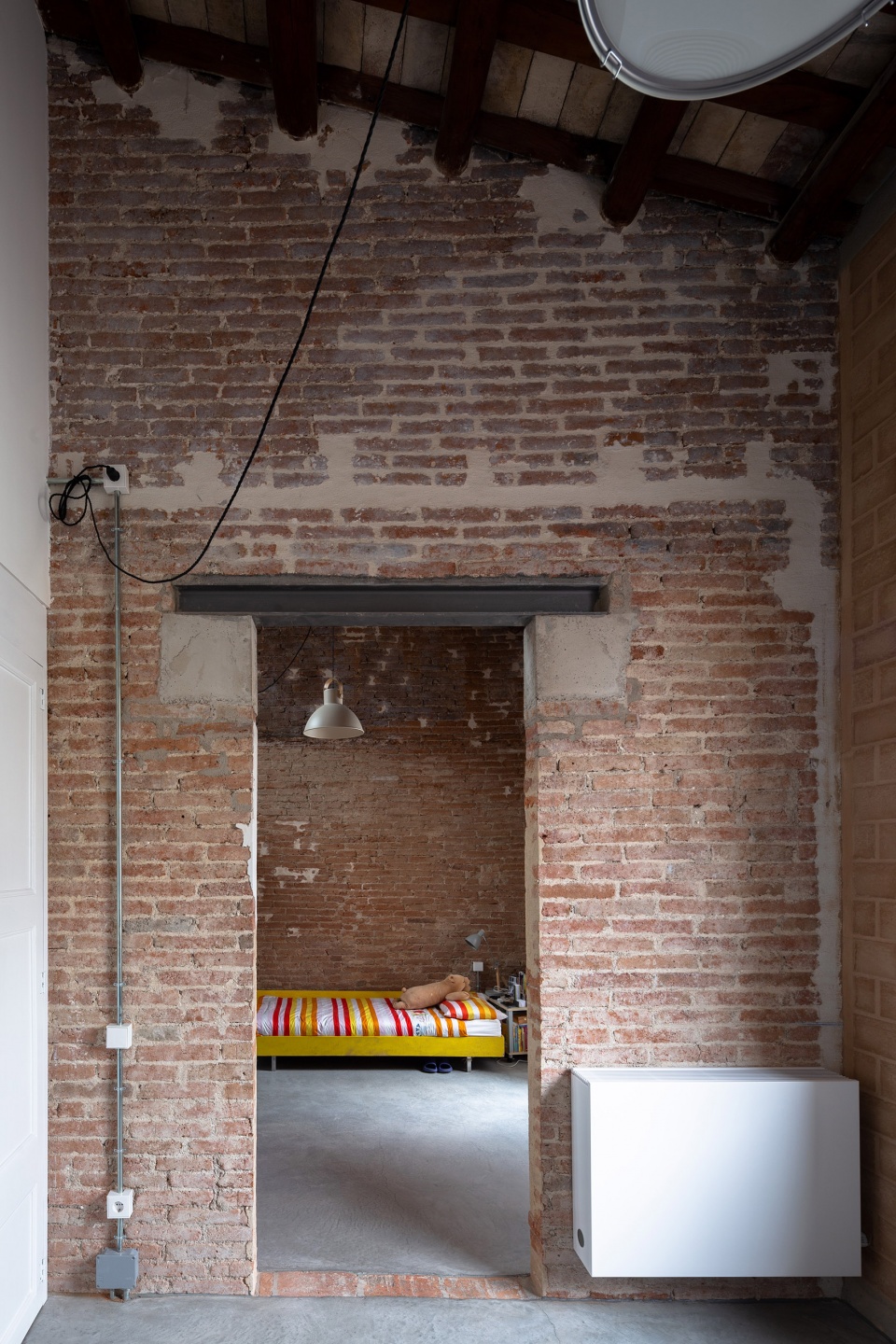 rehabilitation of two adjoining houses installation by arqbag