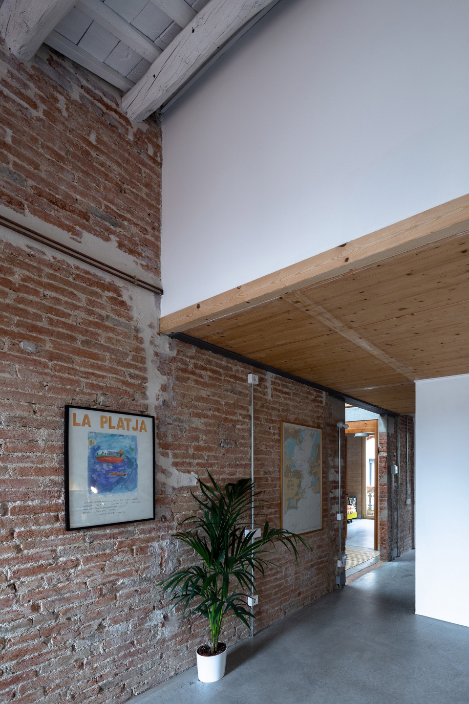 rehabilitation of two adjoining houses installation by arqbag