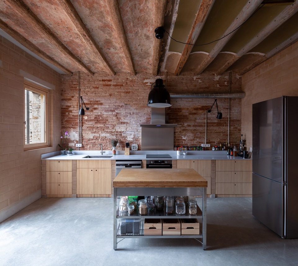 rehabilitation of two adjoining houses installation by arqbag