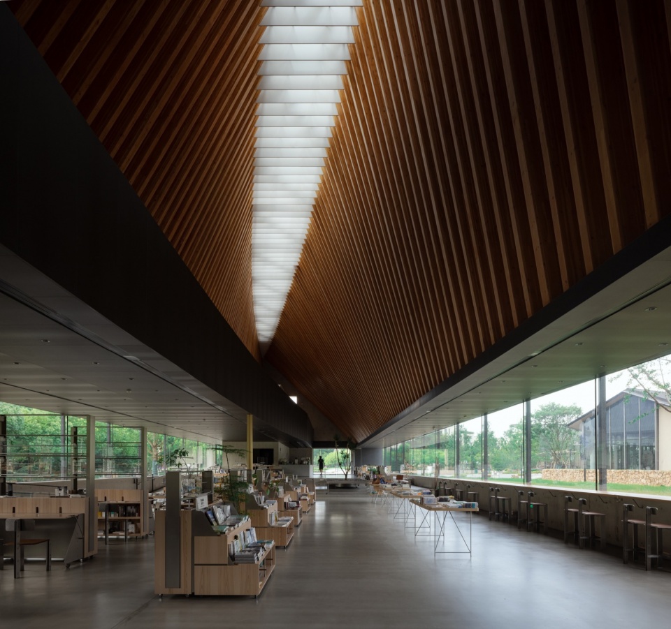 The Big Barn Town Center of Yu Niao Liu Su by Atelier Deshaus