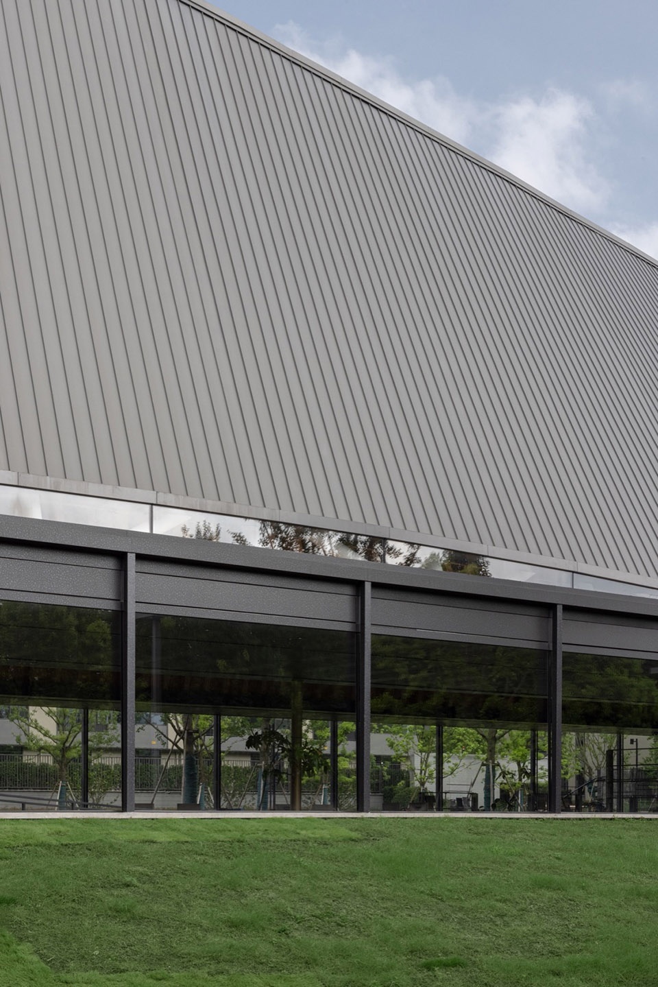 The Big Barn Town Center of Yu Niao Liu Su by Atelier Deshaus