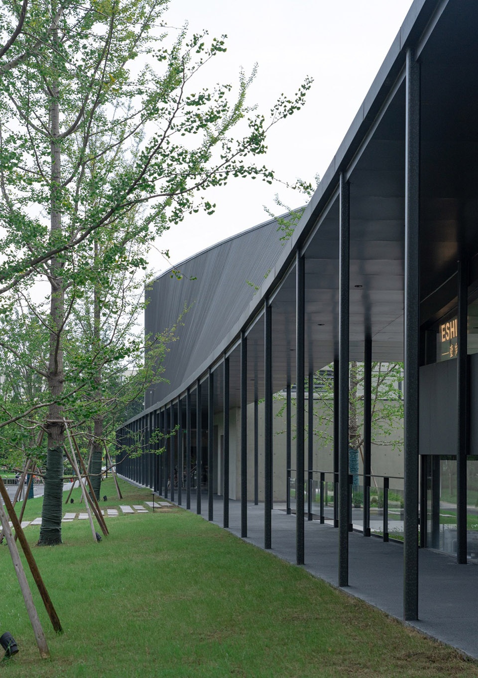 The Big Barn Town Center of Yu Niao Liu Su by Atelier Deshaus
