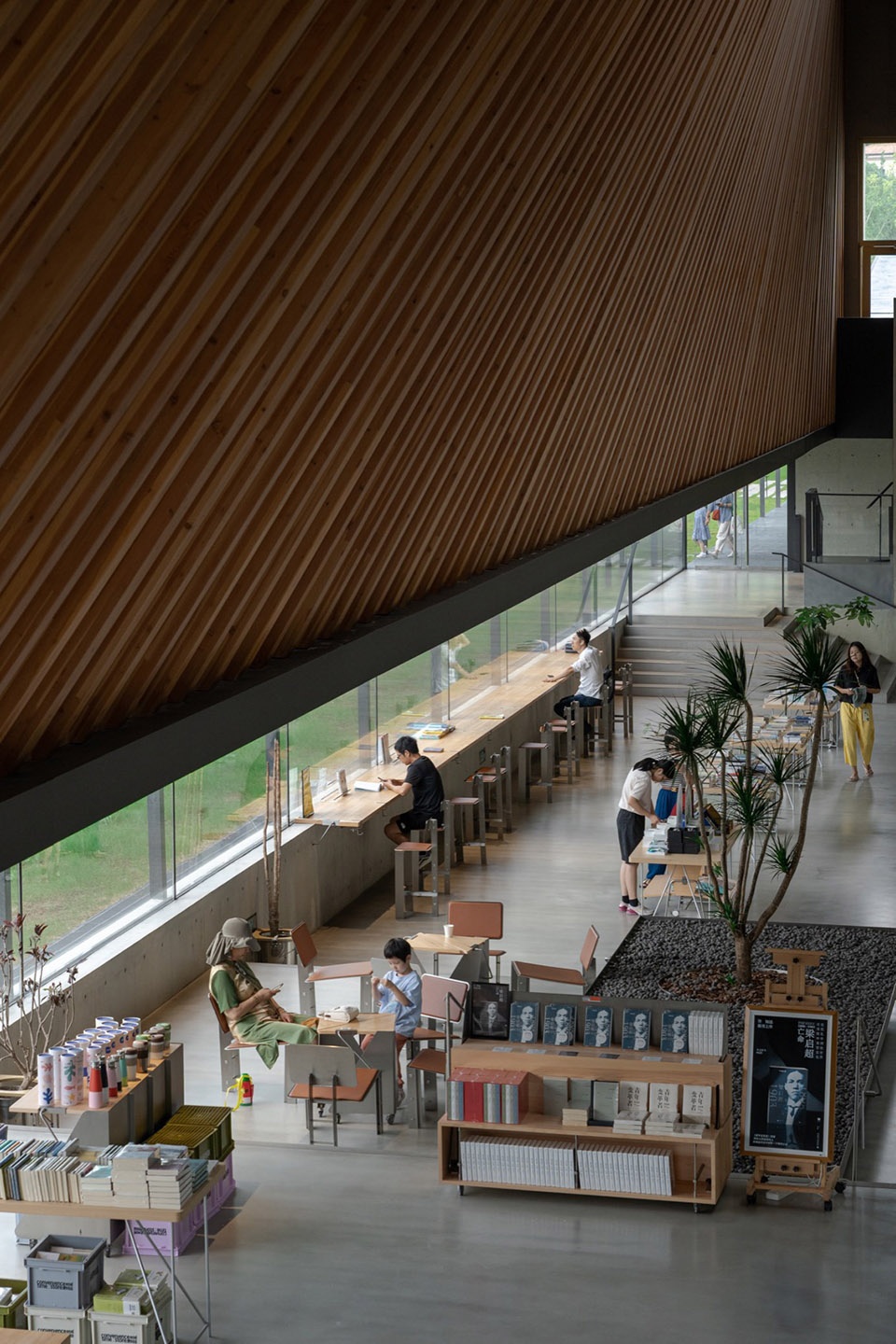 The Big Barn Town Center of Yu Niao Liu Su by Atelier Deshaus