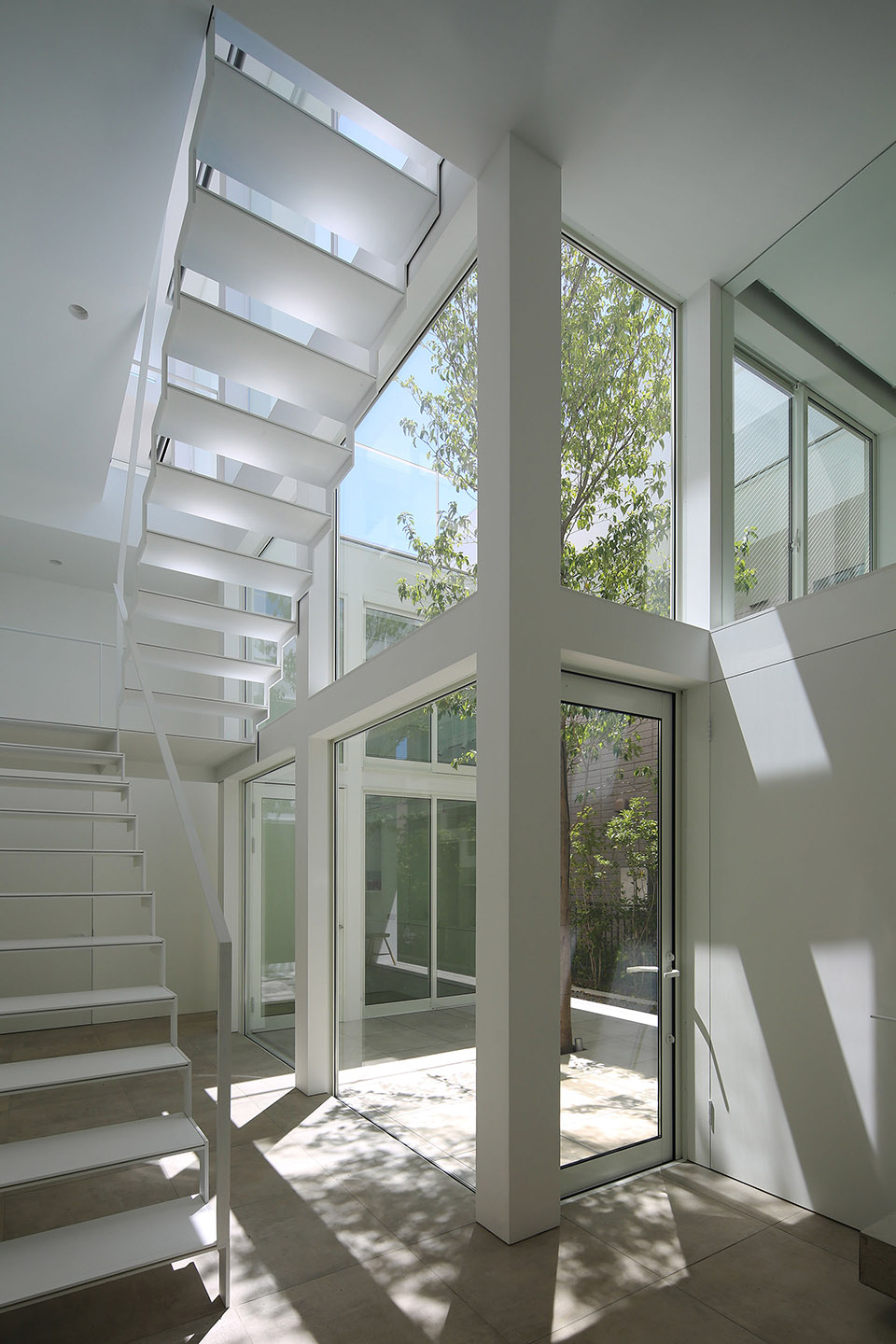 Courtyard House without Second Floor by Takuro Yamamoto Architects